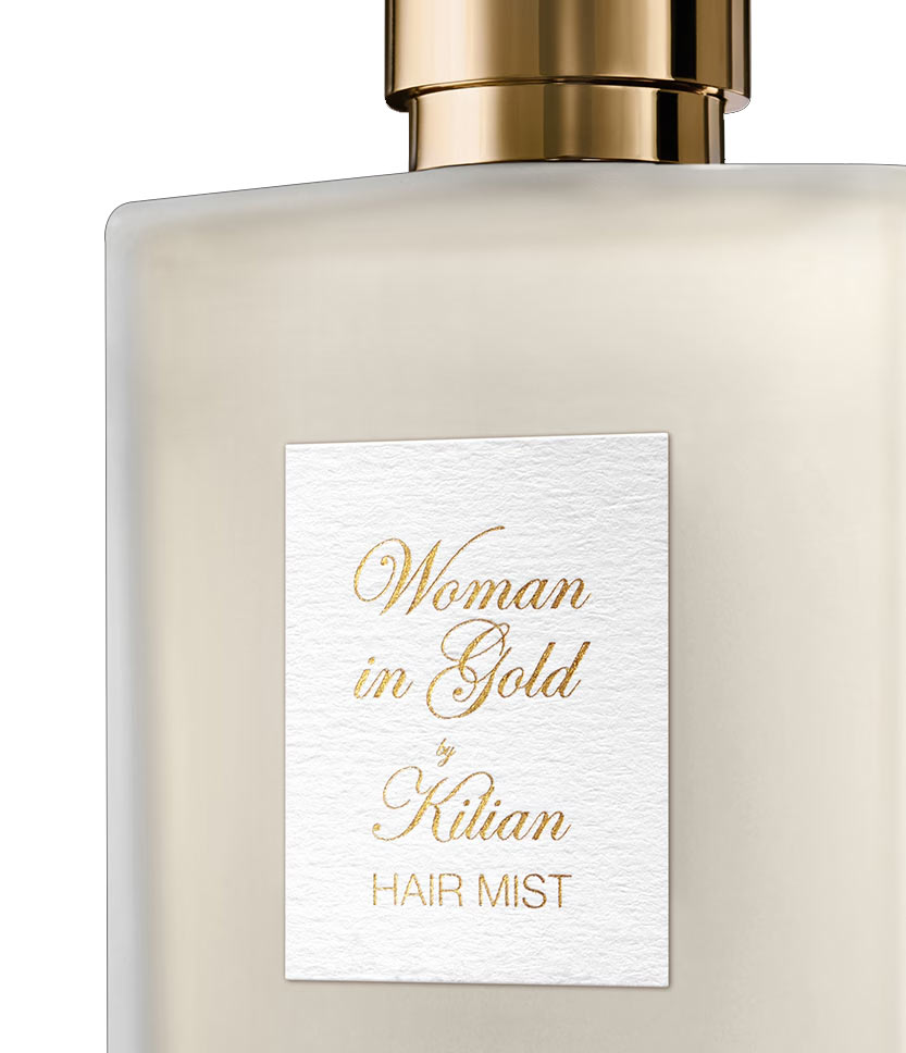 Woman in Gold Hair Mist